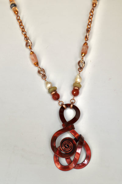 Collana con pendete in rame e pietre dure